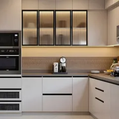 A closer look at the fine details of a modern kitchen. The fluted glass on the upper cabinets adds texture, while the handle-less drawers maintain a seamless and sophisticated profile.