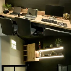 This is our digital hub, where you'll learn to use modern tools to design and conceptualize tattoos before ever touching skin. We teach the entire process, from client conversation to final digital draft.