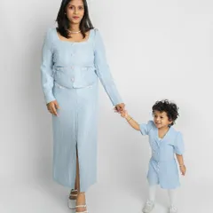 A mother and daughter portrait that feels both elegant and sweet. I guided them into a gentle walking pose to capture their connection and the beautiful matching outfits.