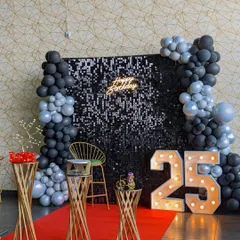 Let's make your birthday or anniversary celebration stylish and modern. We love creating trendy photo-worthy moments with sequin walls, custom neon signs, and marquee numbers, like this chic setup for a 25th birthday.
