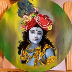 This is a finished oil painting of Lord Krishna on a circular canvas. I focused on creating a serene expression and vibrant colors in his attire, including the detailed red turban and peacock feather, set against a soft green and yellow background.