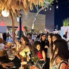 A bustling bar scene at the Tira Beauty x Jio World Drive event. Our team is experienced in managing large crowds and ensuring quick, efficient service at major pop-ups.