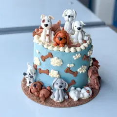 This cake is one of my all-time favorites, made for a true dog lover. It features a variety of handmade fondant dog figurines, each with its own personality, sitting on and around a buttercream cake. It’s a perfect example of how we can turn your passion into a delicious piece of edible art.