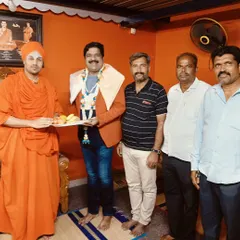 Posing with the Swamiji and organizers after the felicitation ceremony in Chamarajanagar. Their appreciation means a lot.