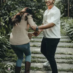 It's the playful, unposed moments that often tell the best stories. Capturing genuine laughter during a pre-wedding session in a beautiful Bangalore garden.