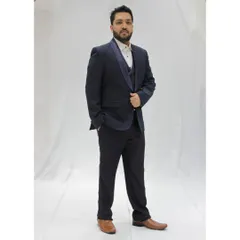 A full view of my formal reception attire. A well-fitted tuxedo is my go-to for creating a sophisticated atmosphere at evening events and cocktail parties.