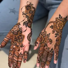 A contemporary design for Teej, featuring geometric blocks and delicate floral vines. This is a great option for someone who wants a modern twist on festival mehendi.