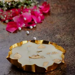 A mini gold metal Urli soy candle, a perfect touch of elegance for Diwali gifting or festive home decor.