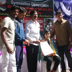 Presenting an award to another deserving student. Seeing their success is my greatest reward as a coach.
