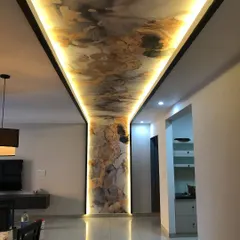 A different perspective of the ceiling installation, showing the beautiful reflection on the glossy floor.