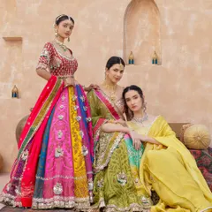 Your bride tribe deserves to look as stunning as you do. We create custom lehengas for the whole squad, playing with vibrant colors and unique designs that complement each other. From bold reds to festive greens and yellows, we'll make sure your entire crew is picture-perfect.