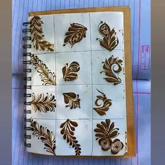 My practice book is filled with drills just like this. We work on different types of leaves and vines so you can build a visual library of elements to use in your own unique designs.
