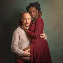 This studio portrait is intense and powerful. The posing, the lighting, and the expressions all come together to create an image that feels like a classic work of art.
