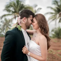 A close-up, intimate portrait from a Goa cliffside proposal shoot. The focus is on the pure emotion and connection between the couple.