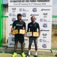 Standing with my doubles partner after a successful ITF Master 200 tournament in Kalina. I secured the doubles title and finished as the singles runner-up.