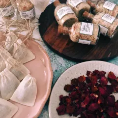 Getting a large order of my bath salts packed and ready to go. Each bottle is filled by hand and finished with a muslin tea bag for easy use.