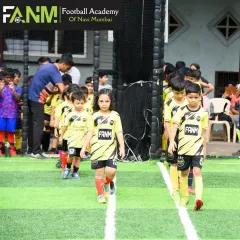 Our youngest players, including boys and girls, confidently marching onto the pitch for their weekend training session. We start building fundamentals and a love for the game from an early age.