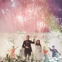 The grand finale of a Sangeet performance, complete with fireworks. We capture the peak moments of your celebration, creating images that are full of energy and excitement.