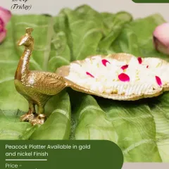 The peacock platter, available in gold and nickel finishes, is a graceful piece for serving prasad or holding flowers during Navratri celebrations.