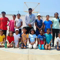 A group shot with my students at the 2024 summer camp. I work with kids of all ages, helping them develop their basketball IQ and on-court abilities.