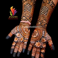 This design shows how different elements can come together in a full bridal set. Notice the detailed architectural jaali work on the forearm and the delicate lotus patterns on the palm and fingers.