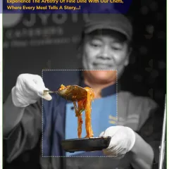 Experience the artistry of fine dining with our chefs. Here, a member of my team proudly presents a freshly prepared noodle dish, telling a story with every meal.