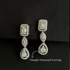 These dangle diamond earrings are perfect for the festive season. The design features multiple cuts of diamonds for maximum sparkle, and I can customize them to be detachable for more versatile wear.