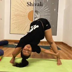 My student Shivali in a deep spinal twist. This pose is fantastic for releasing the back, stretching the hamstrings, and improving digestion.