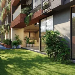The ground floor of the Sanctum apartment building opens up to a landscaped lawn and play area, seamlessly connecting the indoor amenities with outdoor green space.