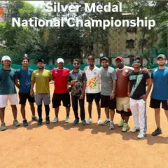 The full ILTA team celebrating with our player Ritik after he secured the Silver Medal at the National Championship. It's a team effort, and we celebrate every victory together.