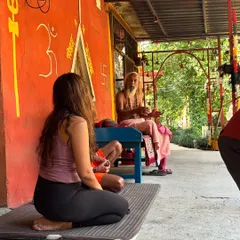 Listening to the wisdom of a sadhu. My journey is deeply influenced by the timeless teachings of the saints and sages of India, and I am forever a student on this path.