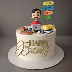 The Dude. A cake for a man who loves to travel, read, and work on his laptop. This cake captures all his favorite things in one edible creation.