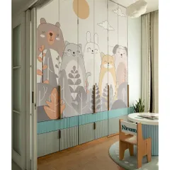 The wardrobe in this kids' room is a piece of art in itself, with adorable hand-painted animal illustrations. The design cleverly conceals the bathroom entry, making the space feel seamless and magical.