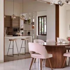 Our 'A Walk in the Clouds' project was featured in The Architect's Diary. This image showcases the elegant dining area, which seamlessly flows into the kitchen, reflecting the home's timeless charm.