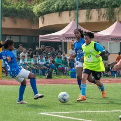 The women's league is a core part of my tournaments. Here, you can see the skill and intensity on display as two players compete for the ball, showcasing the growth of women's football in Bengaluru.