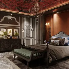 Step into timeless elegance with this classic-themed bedroom. The design features a rich red wallpapered ceiling, a leatherette-paneled bed wall with a statement poster bed, and classic POP mouldings for a royal ambiance.