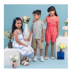 A group shot from a kids' clothing brand photoshoot, showing the sweet and natural interactions between the children. My sessions are designed to be playful, which helps in capturing authentic moments even during a commercial shoot.