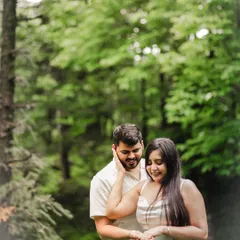 A gentle, romantic portrait in the same forest setting. After the excitement, we take a few moments for quiet portraits that reflect their new status as an engaged couple.