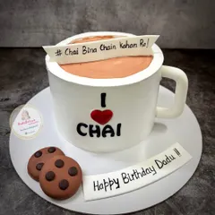 A fun, custom cake I made for a chai lover's birthday. This is a 100% eggless cake sculpted to look like a mug of tea, complete with fondant cookies. It shows how I can turn your unique ideas into a delicious reality for any celebration.