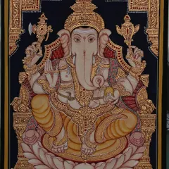 Lord Ganesha seated on a lotus, symbolizing purity and enlightenment. This composition is a favorite for pooja rooms, bringing blessings and removing obstacles.
