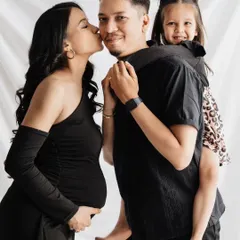 Maternity shoots are for the whole family! It was so much fun capturing the excitement of this soon-to-be big sister. This playful piggyback ride created such a genuine, happy family portrait, celebrating the new baby on the way.