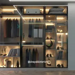 A modern wardrobe should be more than just storage; it should be a display. This walk-in closet features transparent glass shutters and integrated LED lighting, turning the daily routine of picking an outfit into a boutique experience.