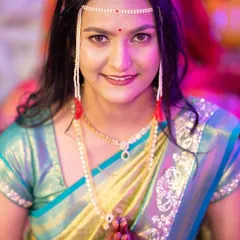A close-up of the beautiful Marathi bride Ritu, showcasing her flawless engagement look. I enhanced her features with a subtle glow and a defined eye, letting her traditional 'mundavalya' and radiant smile be the focus.