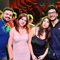 A group of friends having a great time at Tipsy Bull. Seeing people make memories on the dance floor is what it's all about.