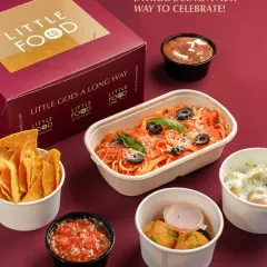 Introducing a new way to celebrate with my custom meal boxes. This image shows a sample meal with spaghetti, nachos, and other sides, all neatly packed in my branded containers, perfect for a personalized party experience.