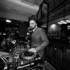 A full view of my setup at a corporate gig. Even in a formal setting, I use professional-grade Pioneer DJ equipment to ensure the best sound.