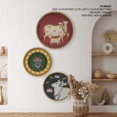 Celebrate Indian heritage with this set of three circular Pichwai art prints. The intricate details of the cows and Shrinathji are beautifully highlighted within the modern round frames.