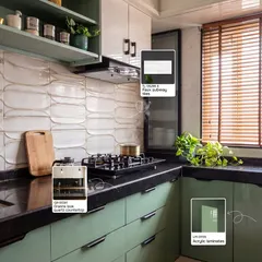 Here is a perfect example of a modern kitchen with a desi soul. I've tagged the exact materials used, from the sage green acrylic laminates to the wavy subway tiles and granite-look quartz countertop. This shows how you can get a high-end look with smart material choices that are both beautiful and practical.