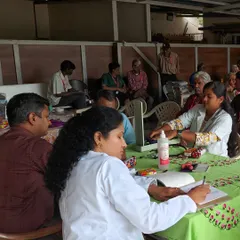 My team and I taking notes and examining patients at the free camp. Every person deserves access to proper skin health diagnosis and treatment.