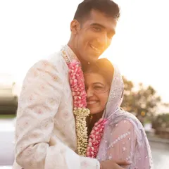 A quiet hug in the warm glow of the setting sun. I always chase this golden hour light because it wraps couples in a dreamy, magical atmosphere, making for truly heartfelt and timeless portraits.